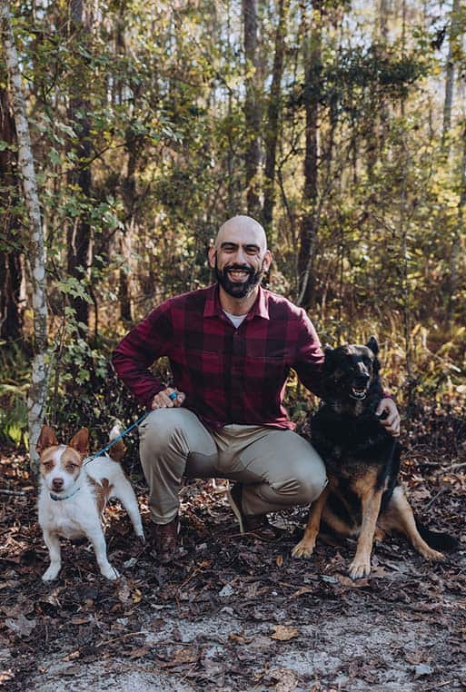Jorge, expert dog trainer in Miami, FL, with his dog.